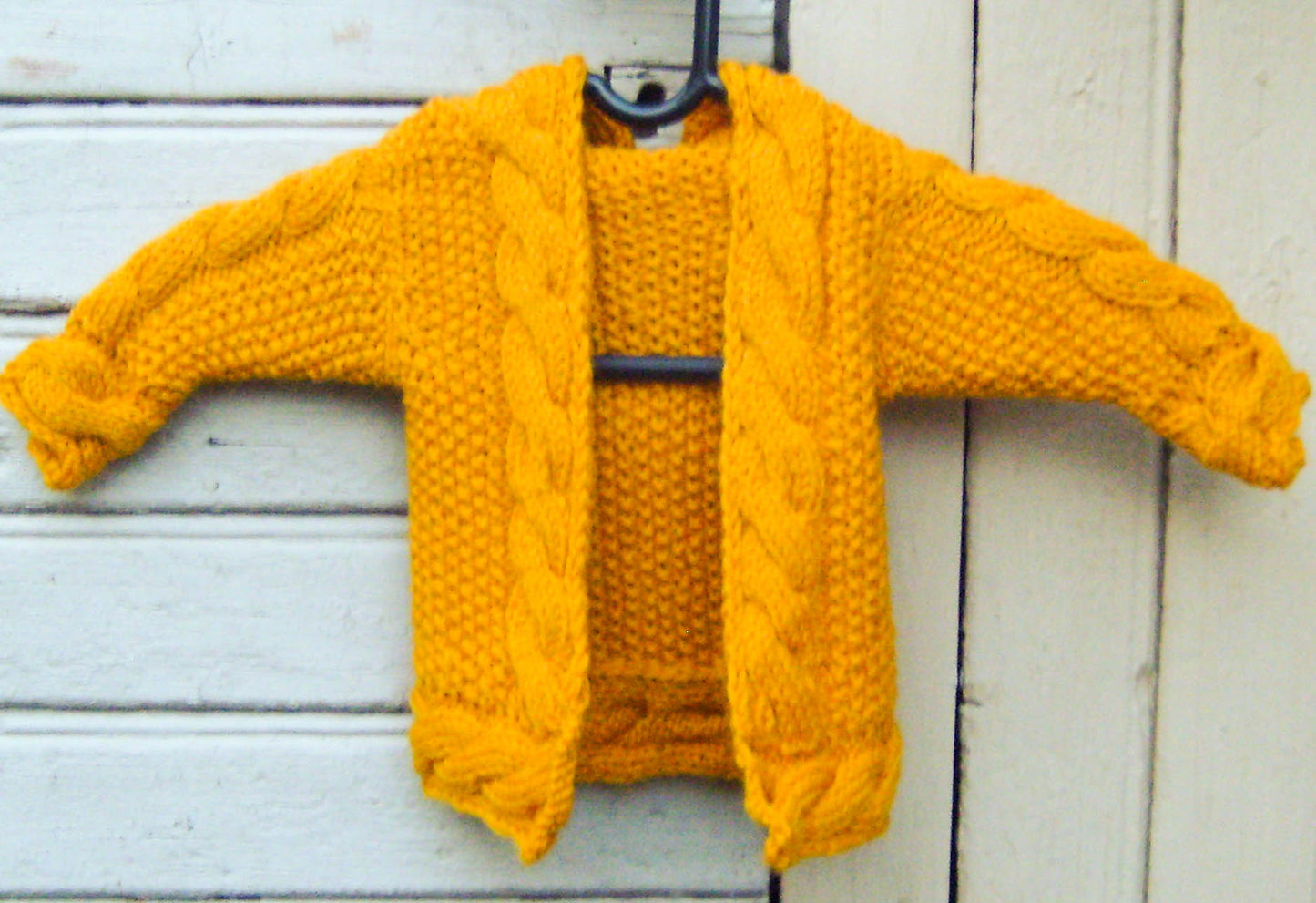 Tellervo - Cabled Baby Hooded Cardigan Knitting Pattern